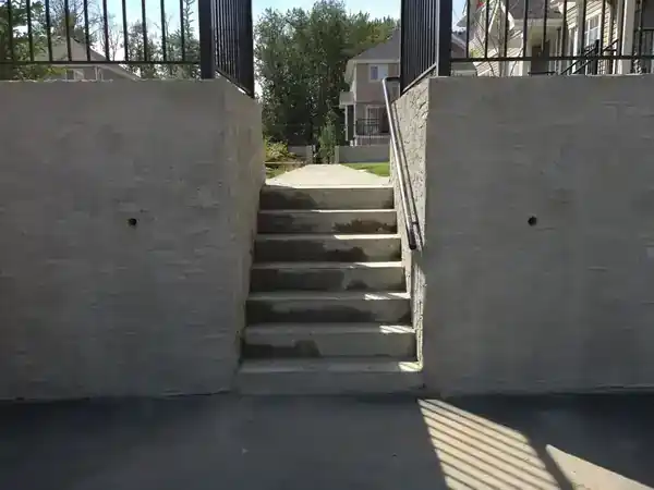 Completed parging on a multi-family retaining wall in the Edmonton area